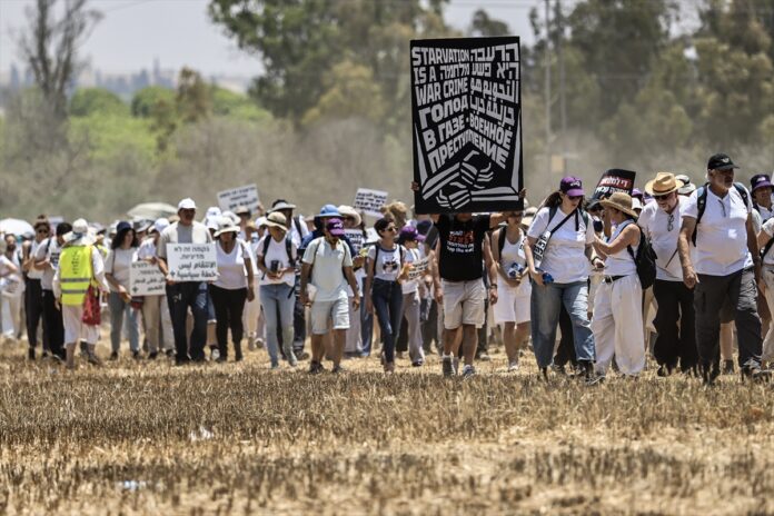 AA-20250606-38206866-38206849-GROUP_OF_ACTIVISTS_ORGANIZED_A_DEMONSTRATION_ON_THE_GAZAISRAEL_BORDER-696x464-1